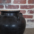 large glazed 4-handle pot black.