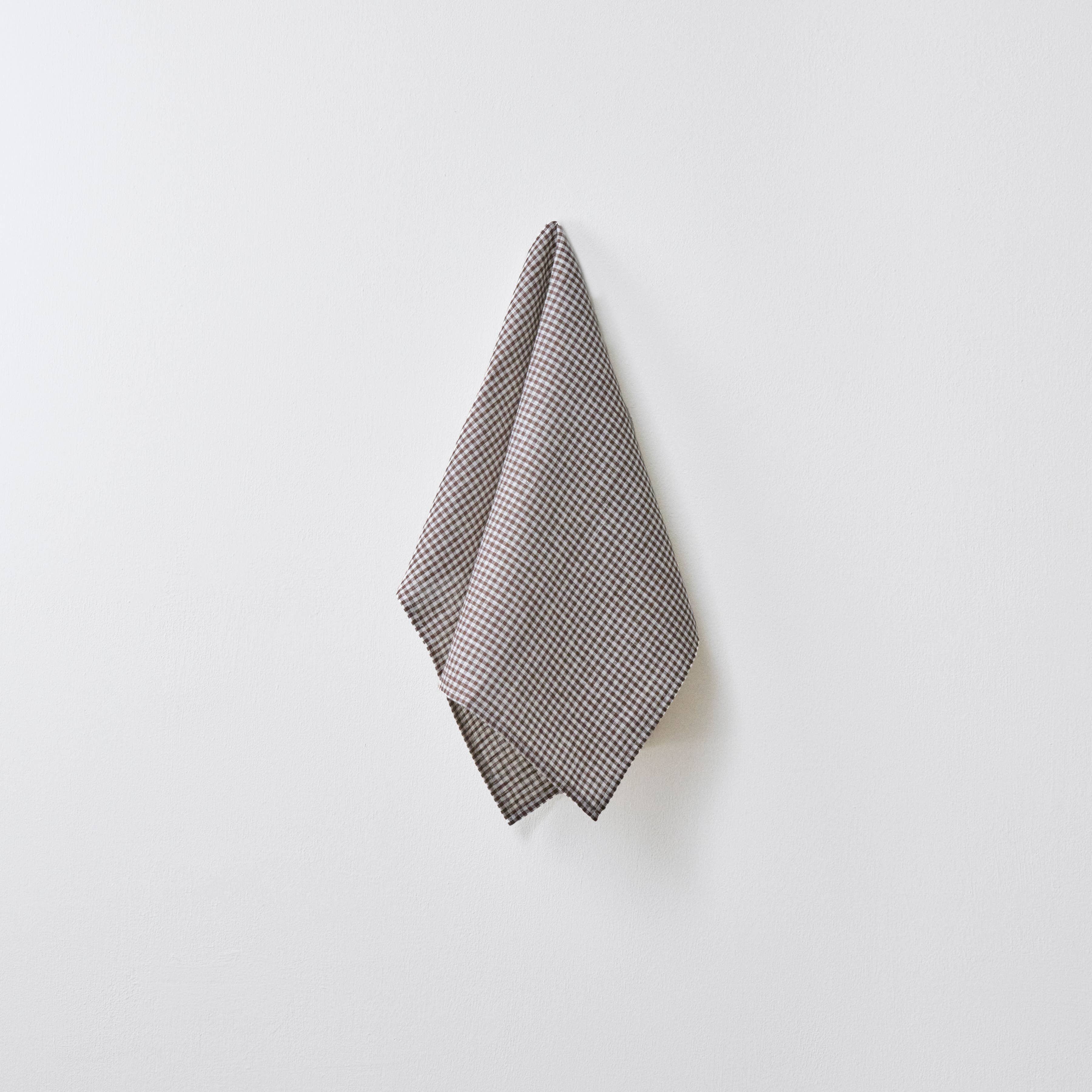 brown and white linen check tea towel.