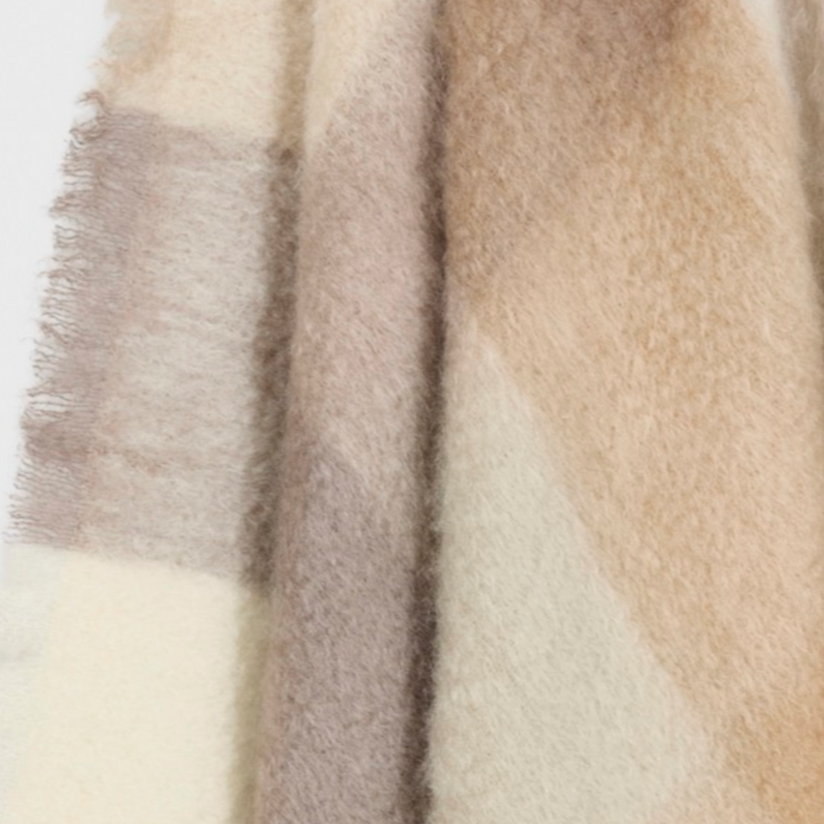 mohair throw blanket in giant buffalo check and warm neutral colors.