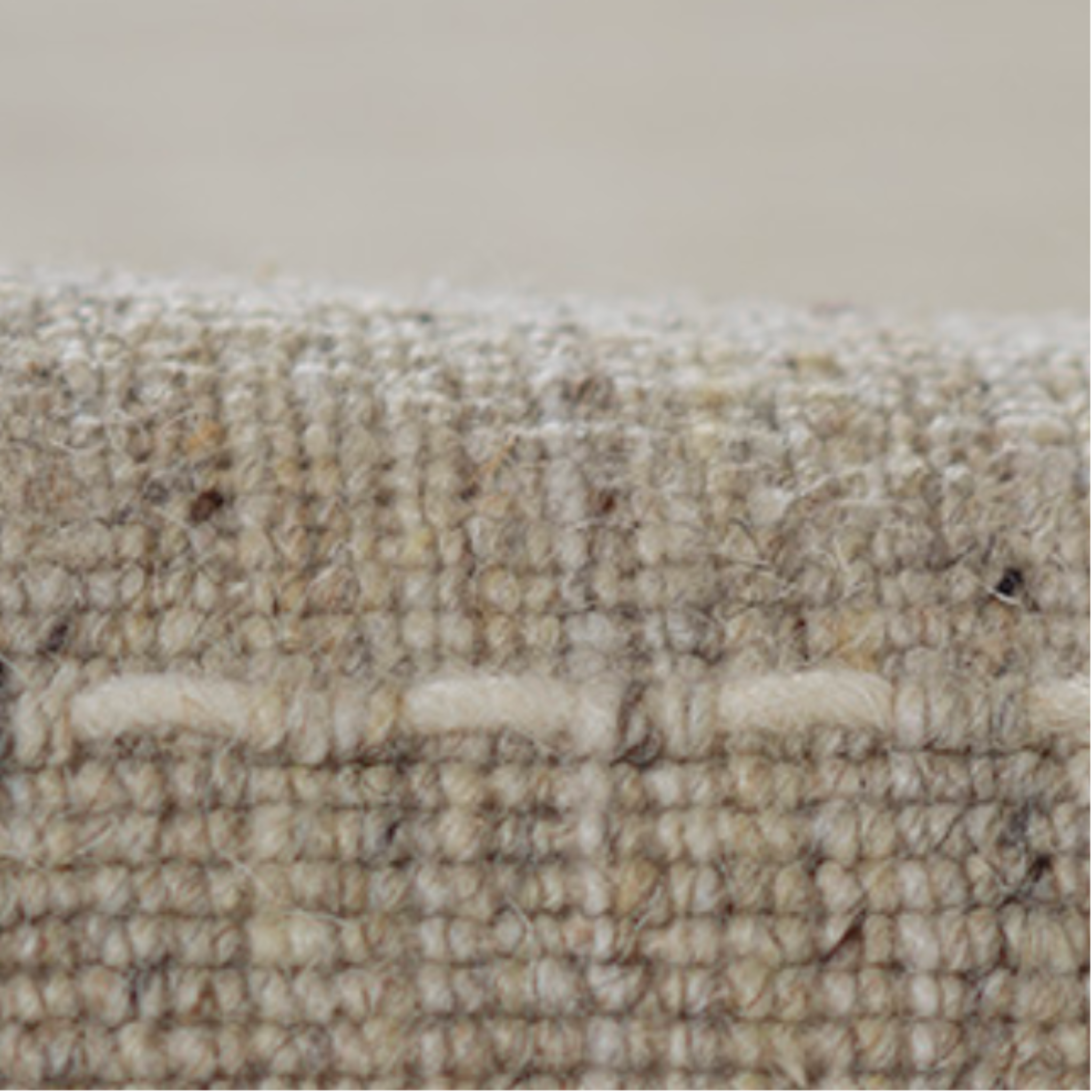 neutral rug with texture stripe.