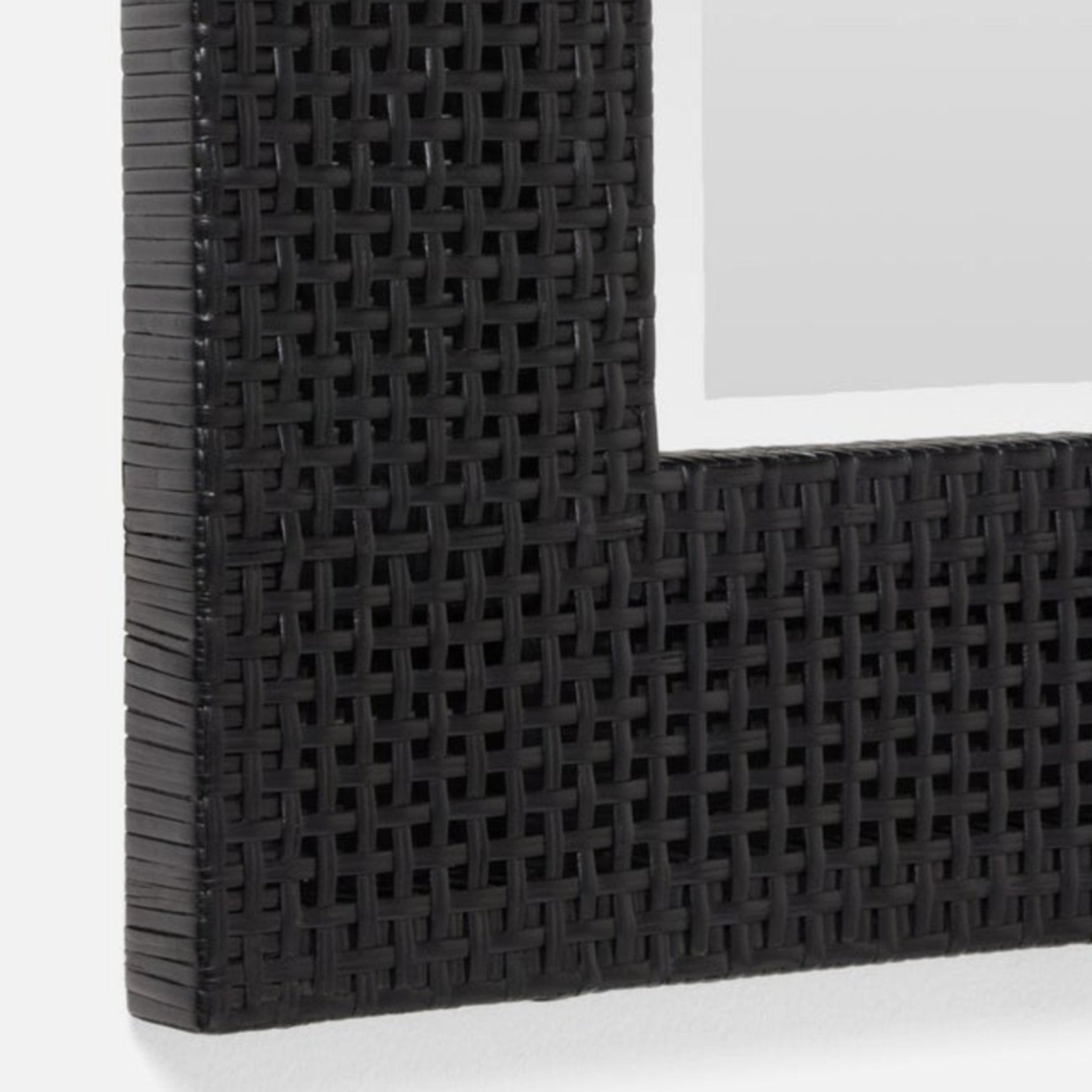 Elegant Black Rattan Mirror – classic style and sophistication.