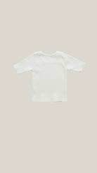pink chicken - girls organic rib top in antique white.