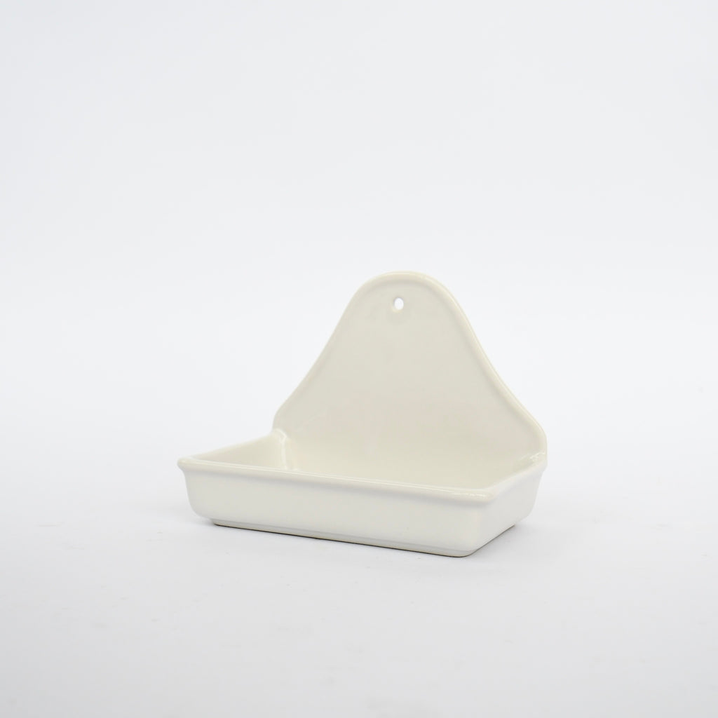 White triangular Creative CO-OP premium stoneware soap dish on a white background.
