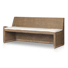 Left arm facing large dining bench with woven natural brown rattan frame, flax/linen cushion in Broadway Dune, 72 inches wide, ideal for relaxed dining.