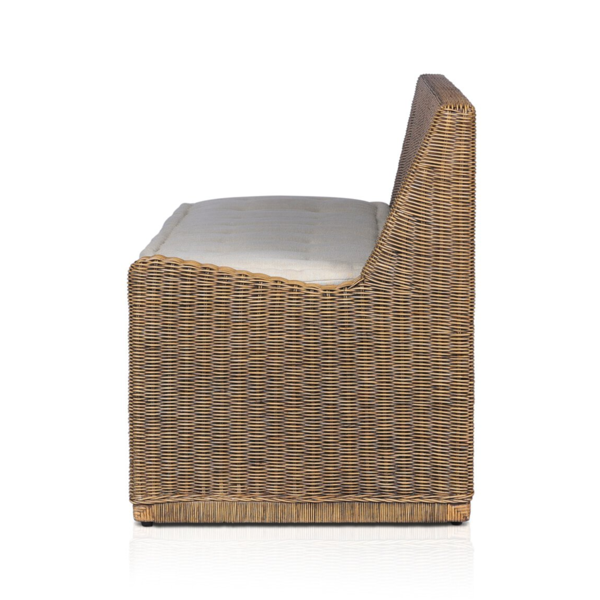 Right arm facing large dining bench with natural woven brown rattan frame and flax/linen cushion in Broadway Dune, 72 inches wide.