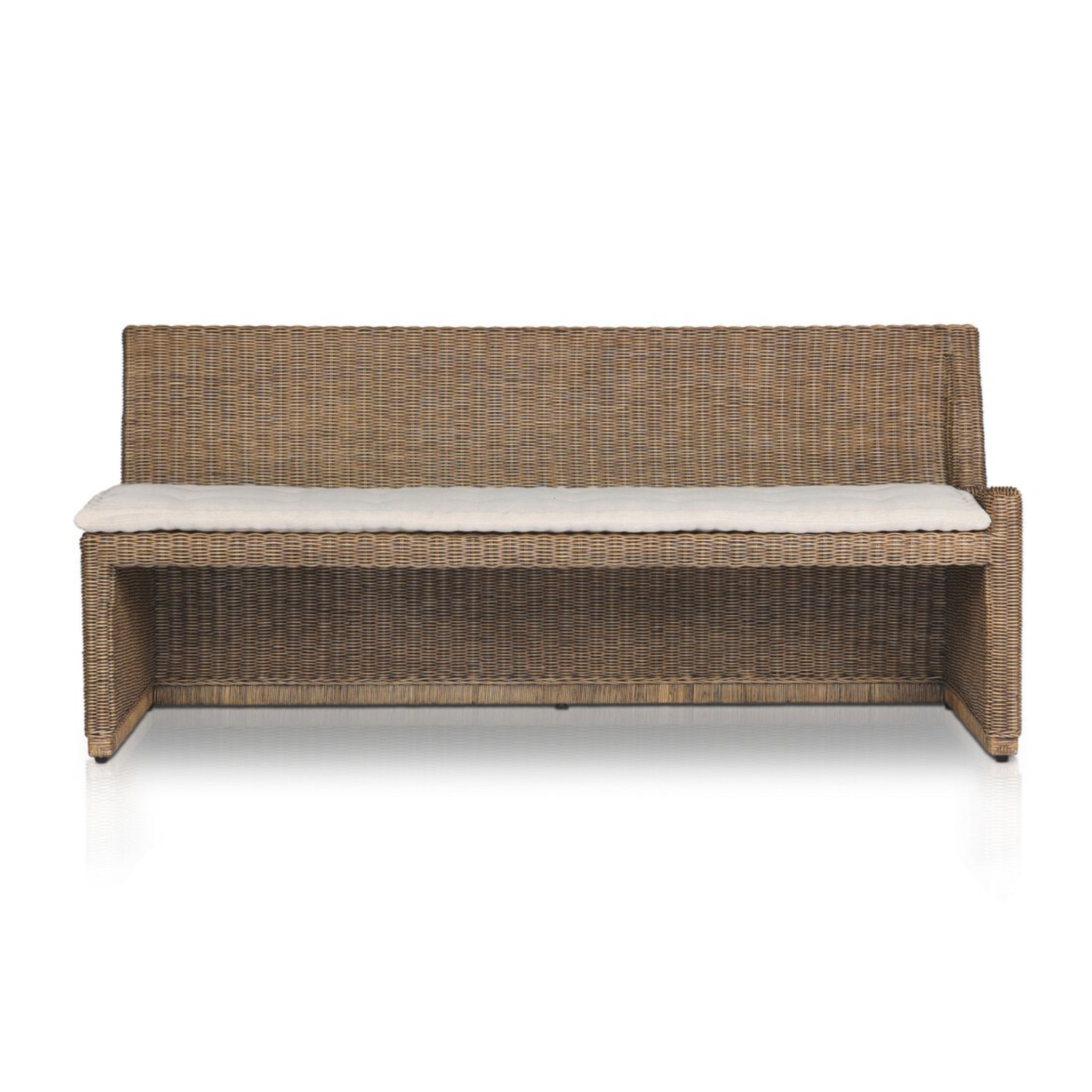 Right arm facing large dining bench with natural woven brown rattan frame and flax/linen cushion in Broadway Dune, 72 inches wide.