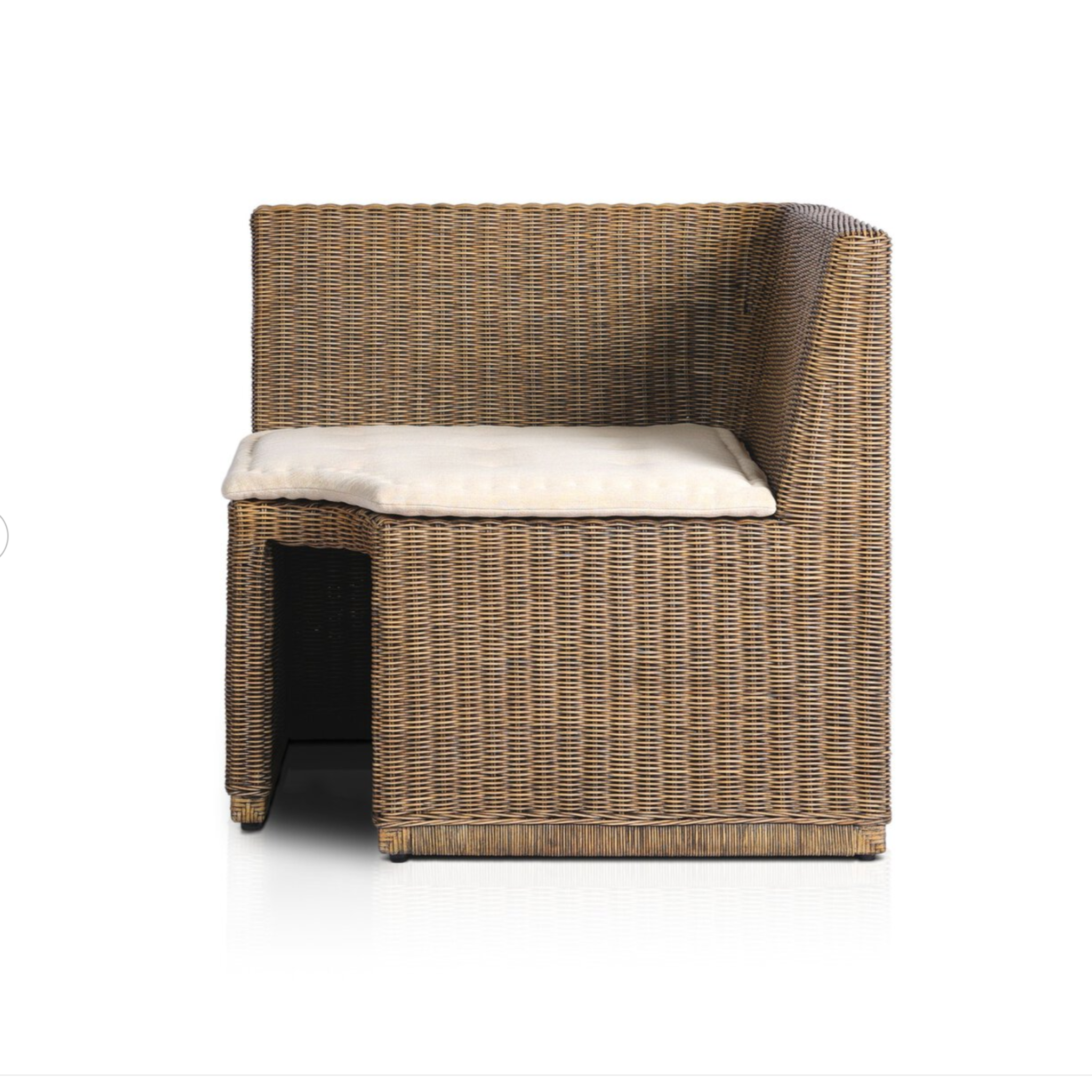 Rattan square corner bench with natural woven brown rattan frame and flax/linen cushion in Broadway Dune, ideal for dining or sunroom seating.