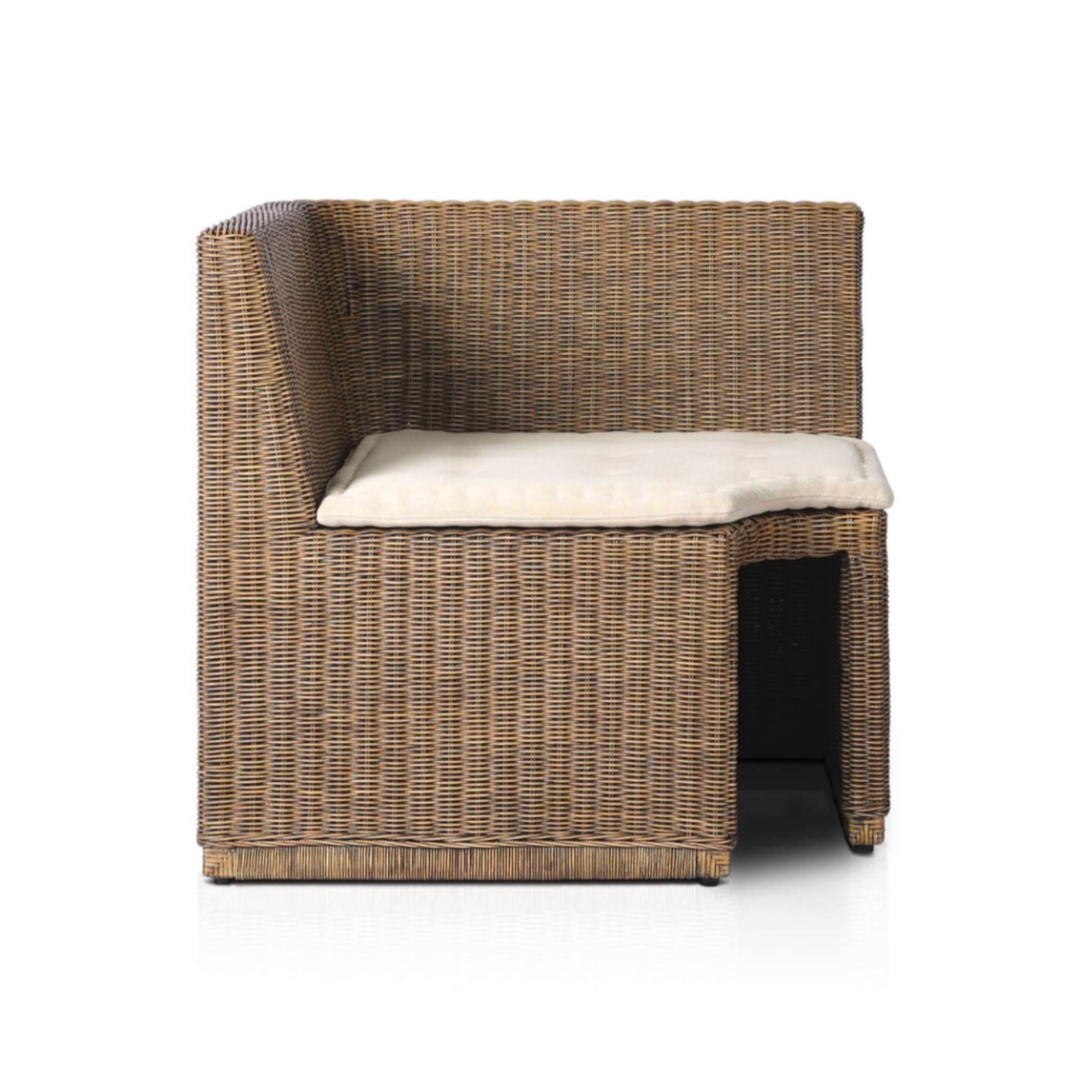 Rattan square corner bench with natural woven brown rattan frame and flax/linen cushion in Broadway Dune, ideal for dining or sunroom seating.