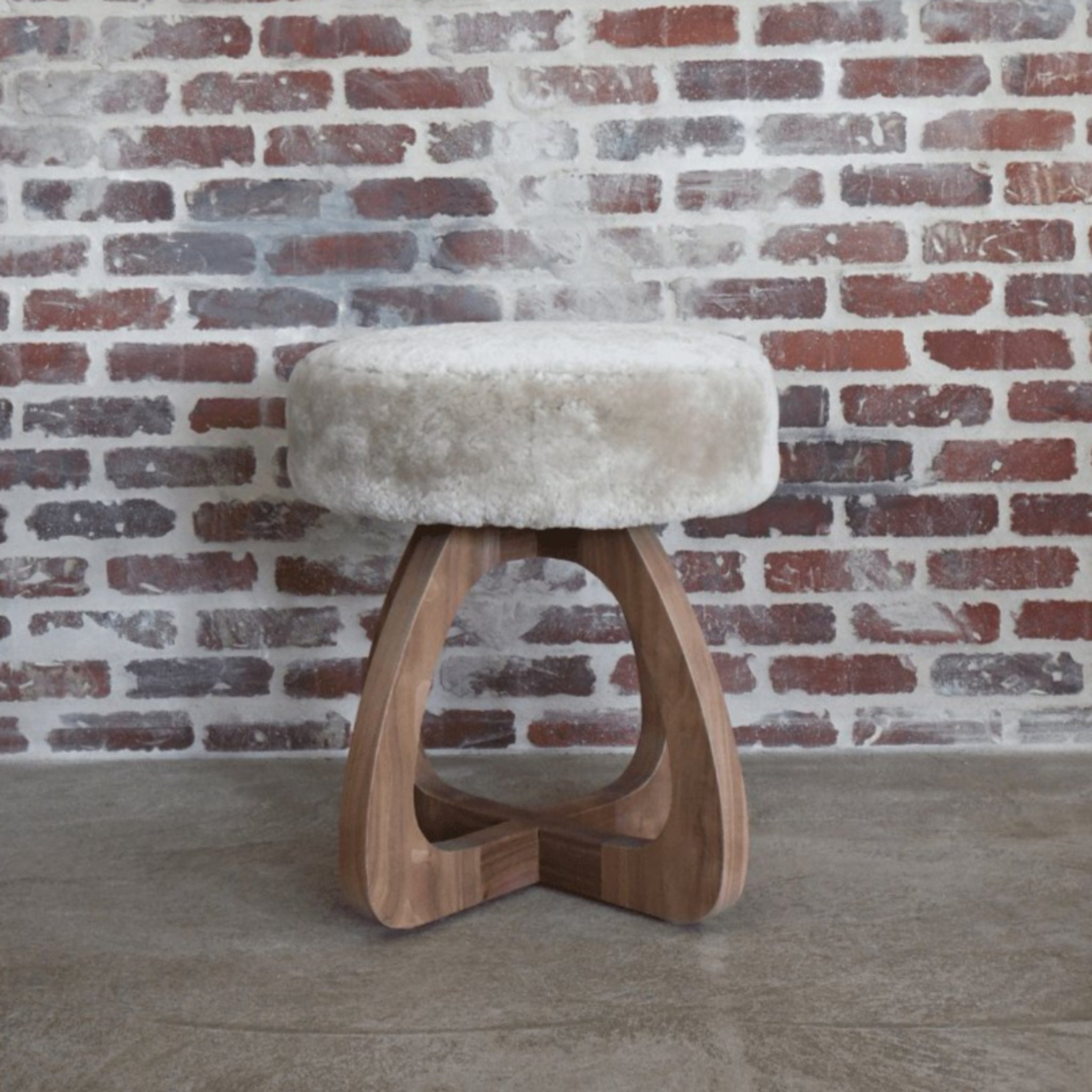 Verellen Shearling and Walnut Swivel Dining Stool.