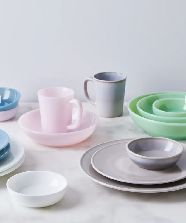 Set of three vintage milk glass nesting bowls by Mosser Glass, elegant translucent white kitchenware for serving and display.