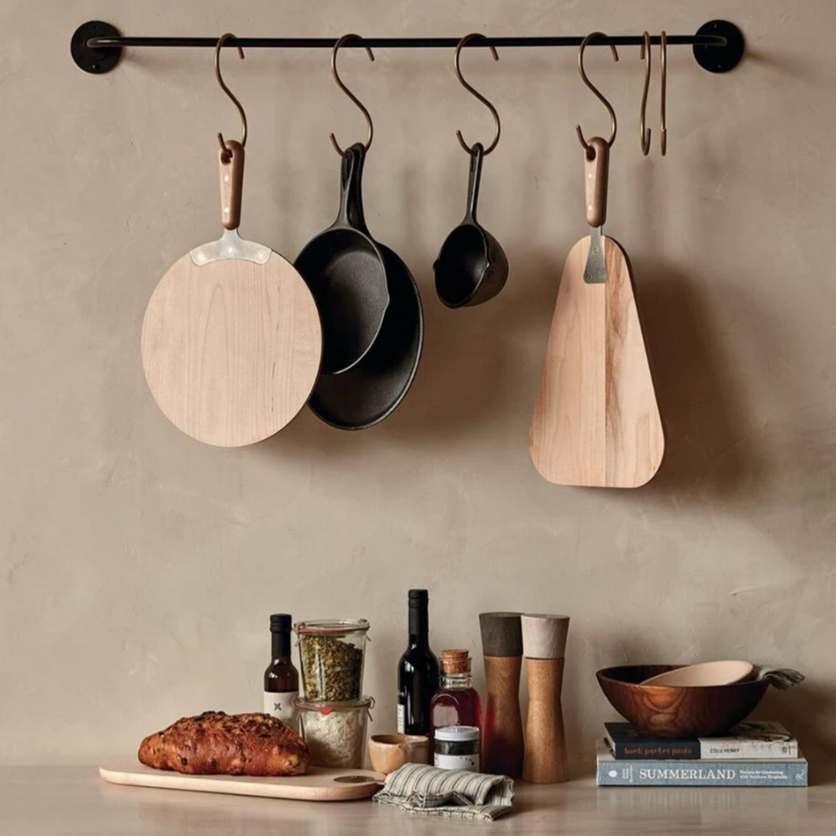 Otto round Maple Wood Cutting Board with Brass Handle.