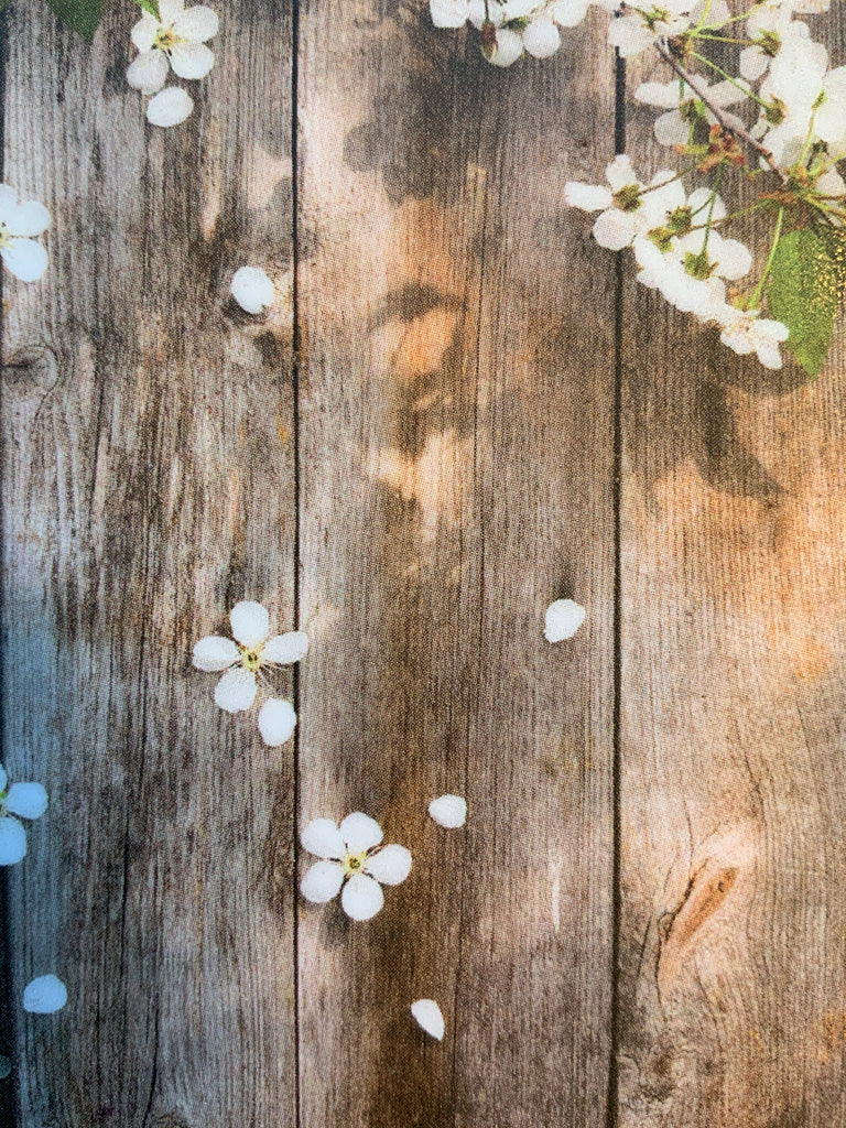 White blossoms scattered on a rustic wooden board, making it the perfect last-minute gift for that special someone. Shoppe Details + Design Gift card.